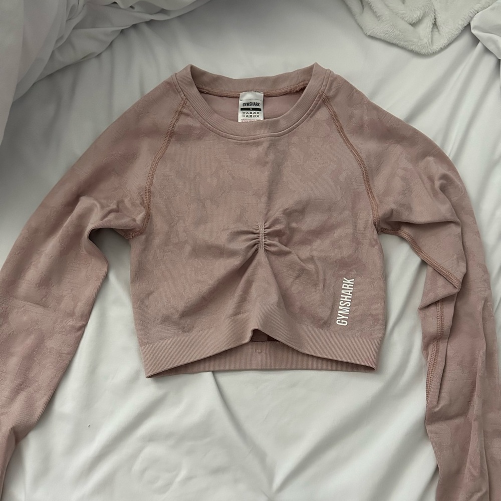 small stain on left sleeve